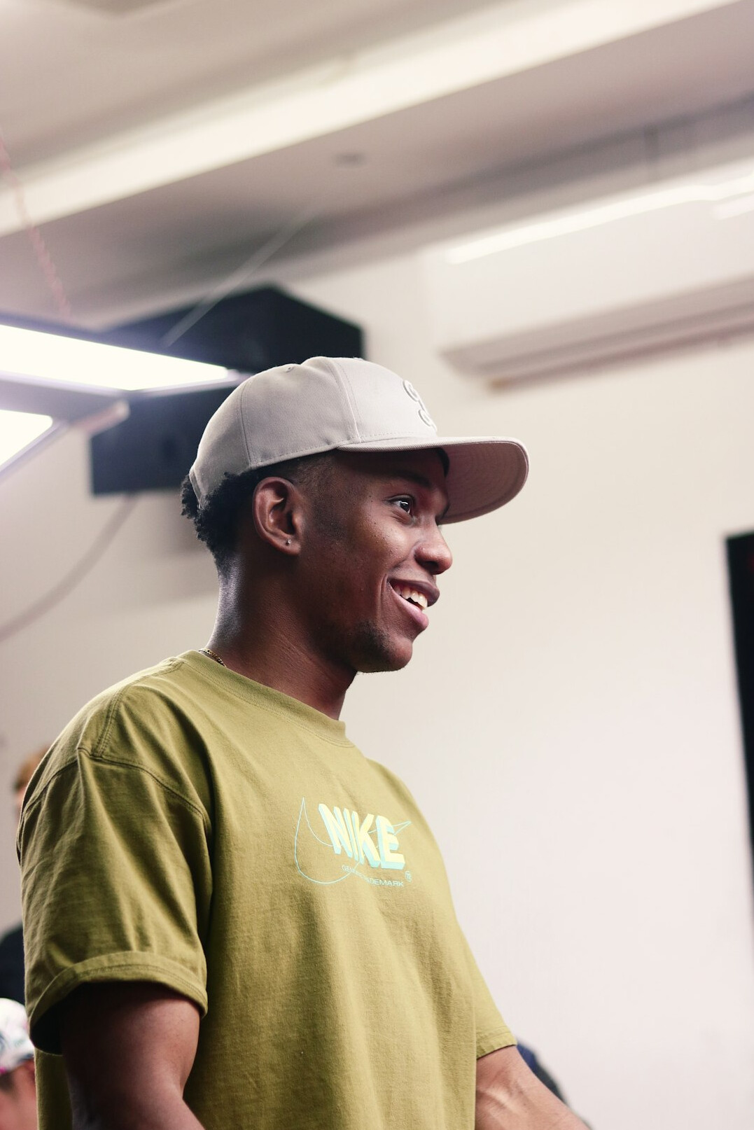 Broadcast course instructor smiling at camera