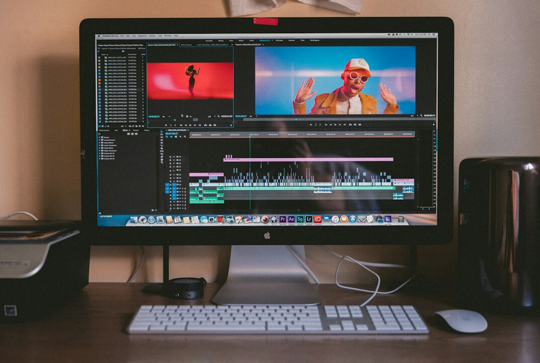 Video operator working at editing and playout desk